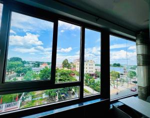 a view of a city from a window at Khách Sạn The Second in Thốt Nốt