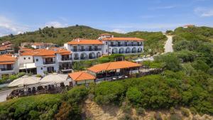 an aerial view of a building on a hill at Sunset Hotel in Ouranoupoli