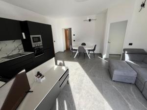 a living room with a couch and a table at Casa Vian in Vigo di Fassa
