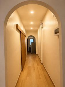 an archway leading to a hallway in a house at Cloud Nest House Betong in Betong