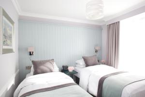 Krevet ili kreveti u jedinici u okviru objekta Hayes Hotel