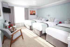 Krevet ili kreveti u jedinici u okviru objekta Hayes Hotel