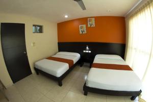 Postel nebo postele na pokoji v ubytování Hotel & Suites Domani