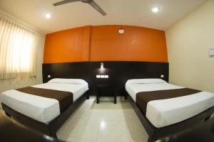 Postel nebo postele na pokoji v ubytování Hotel & Suites Domani