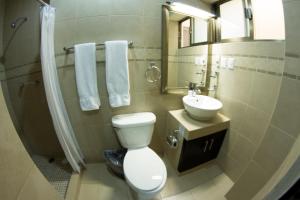 Koupelna v ubytování Hotel & Suites Domani