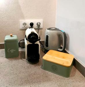 a coffeemaker and a coffee maker on a counter at Bella Lucía in Lloret de Mar