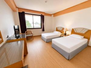 Ліжко або ліжка в номері Karin Hotel
