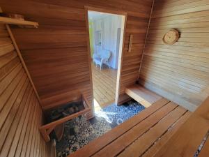 an overhead view of the inside of a sauna at Les Gîtes de la chapelle blanche in Anor +35 photos