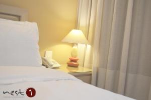 Postel nebo postele na pokoji v ubytování Nest 1 Hotel