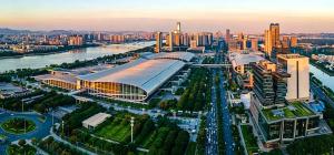 an aerial view of a city with a large building at Bene International Hotel Zhujiang New Town US Consulate General Guangzhou Branch in Guangzhou