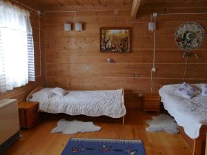 Postel nebo postele na pokoji v ubytování Dom z widokiem na Tatry