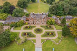 an aerial view of a large house with a garden at Wells House & Gardens Self Catering 3 Bedrooms & Sofa Bed Sleep8 in Glenranny