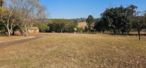 an empty field with a tennis ball in it at Azalea at Greenway Woods in White River +2 photos