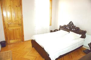 Postel nebo postele na pokoji v ubytování Guesthouse Zedafoni