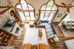 an overhead view of a living room with large windows at Lakefront Group Stay, Sleeps 19, Indoor Pool, Hot Tub, Arcades in Terre Haute