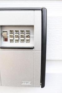 a silver microwave oven with its door open at Ado Pension in Wedel