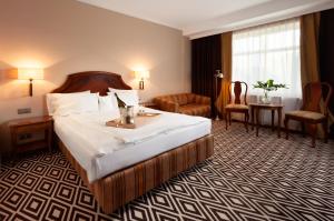 Voodi või voodid majutusasutuse Hotel Rejs toas