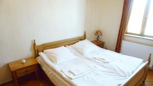 Postel nebo postele na pokoji v ubytování Guesthouse Zedafoni