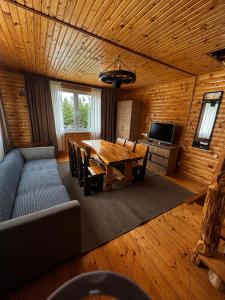 a living room with a table and a couch at GSpace in Yaremche