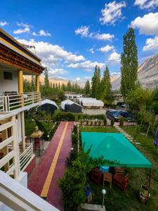 a view of a backyard with a green pool at Hotel Nubra Delight and Camps in Hundar
