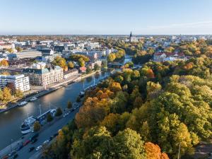 an aerial view of a city with a river at Original Sokos Hotel Wiklund in Turku