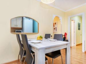 a dining room with a table and chairs at Apartment Buenos Aires by Interhome in Lloret de Mar
