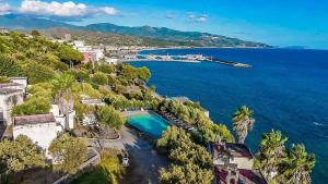 an aerial view of a town and the ocean at Villaggio Club Tortorella in Marina di Casalvelino
