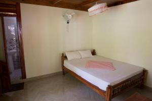 Munroe Nest Homestay客房内的一张或多张床位