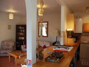 a kitchen with a counter top in a room at The Pottery Annexe in Baslow