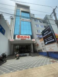 a building with a sign on the front of it at Hotel GREEN LEAF in Hyderabad