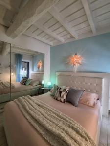a bedroom with two beds in a room with at PapalePapale Home in Viterbo