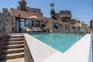 an image of a swimming pool in a villa at Volta Seaside Boutique Hotel in Kokkini Khanion