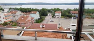 a view from a balcony of a town with a street at Ayışık Otel in Hamidiye +11 photos