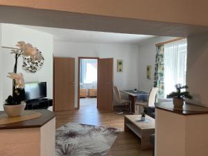 a living room with a couch and a table at Vermietung Ronner in Vordernberg
