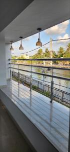 a view of a river from a building balcony at Pearl's Lake House in Cochin