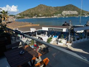 a restaurant with a view of a body of water at AsiaHOTEL in Bodrum City