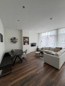 TV i/ili multimedijalni sistem u objektu BnB Bruxelles - Studios & Apartments