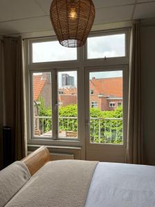 Krevet ili kreveti u jedinici u okviru objekta BnB Bruxelles - Studios & Apartments