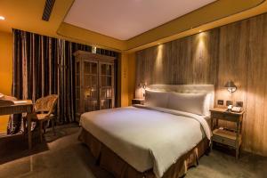 Voodi või voodid majutusasutuse inhouse Hotel toas