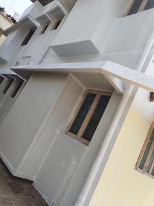 a building with a window on the side of it at Shashtri nagar AC homestay in Kolhapur