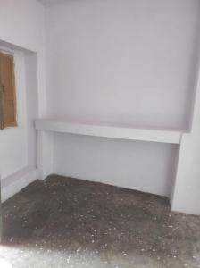 an empty room with a white bench in the corner at Bhati Bhawan in Bārmer