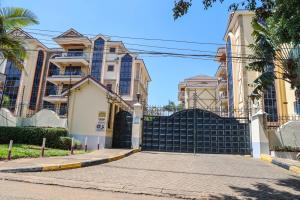 a gate in front of a building at Legacy Homes in Nairobi