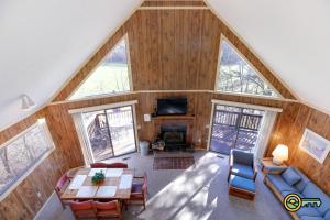 an overhead view of a living room with wood paneling at Villa #8 in Basye