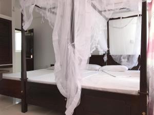 Letto o letti in una camera di Hotel Blue Sky