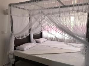 Letto o letti in una camera di Hotel Blue Sky
