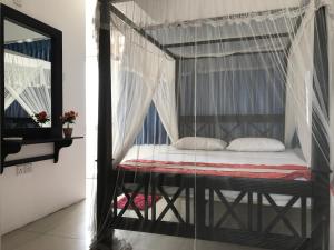 Letto o letti in una camera di Hotel Blue Sky