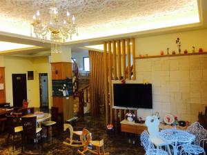 TV o dispositivi per l'intrattenimento presso Sweetlight B&B