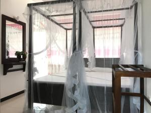 Letto o letti in una camera di Hotel Blue Sky