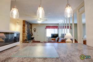 a kitchen and living room with a large counter top at Aspen East Unit #122 in Basye