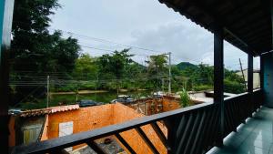 a balcony of a building with a view of a city at Hostel Agatha in Paraty